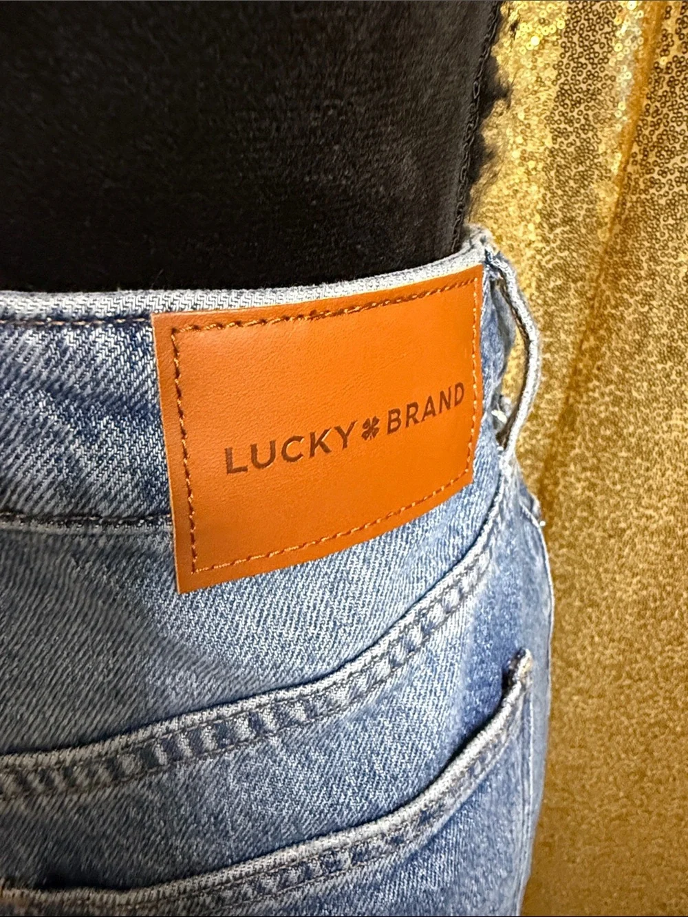 Lucky Brand Light Blue Denim Jeans with Tan Leather Logo Patch